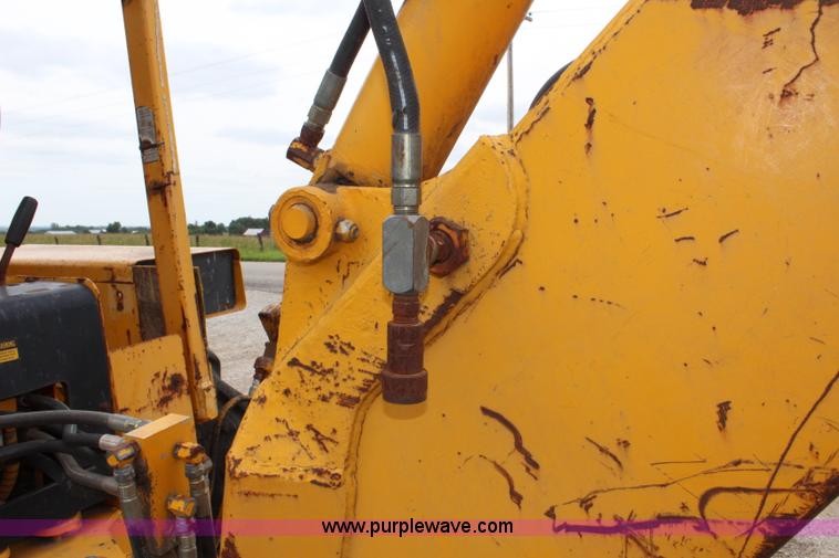 image for item J5898 1979 John Deere 310A backhoe