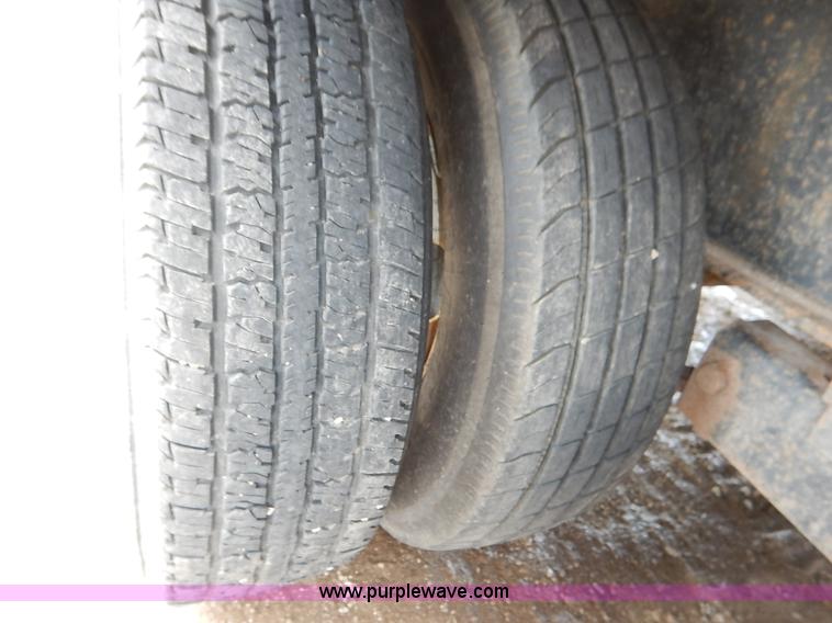 image for item J3789 2000 Buck Dandy flatbed trailer