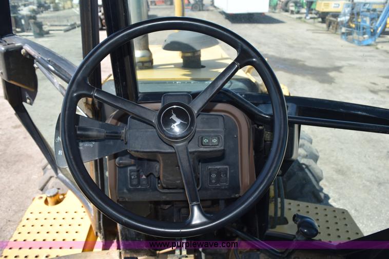 image for item L2565 1997 John Deere 310SE backhoe