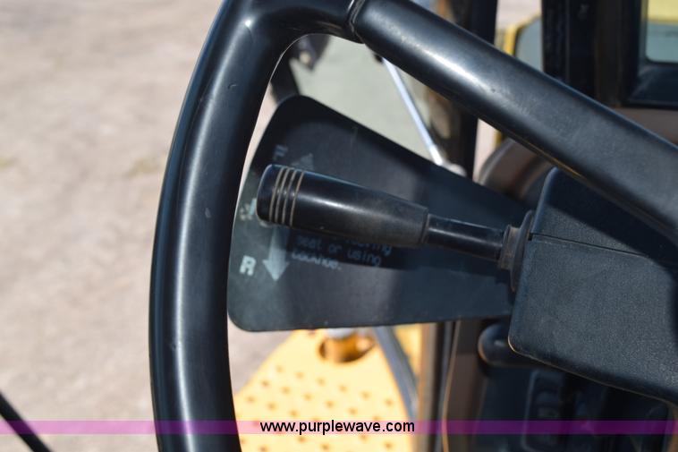 image for item L2565 1997 John Deere 310SE backhoe