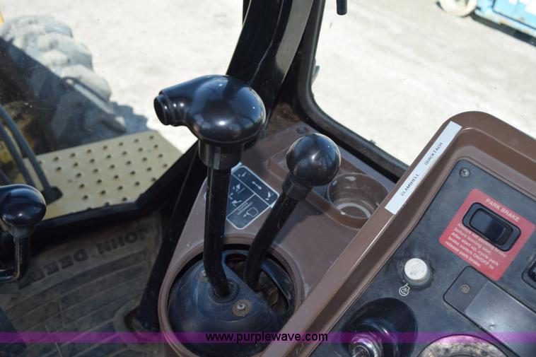 image for item L2565 1997 John Deere 310SE backhoe