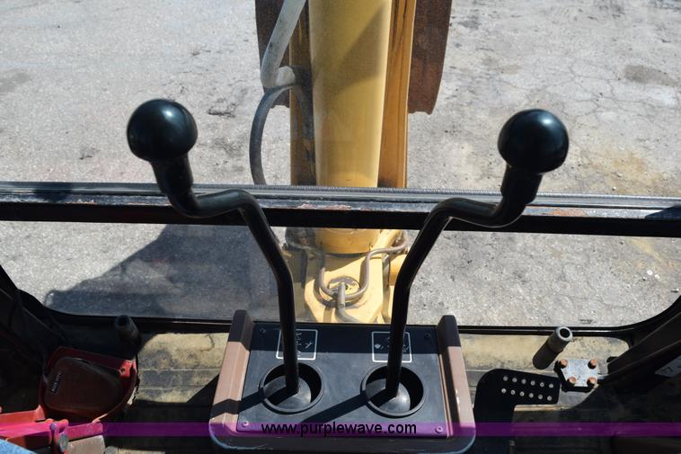 image for item L2565 1997 John Deere 310SE backhoe