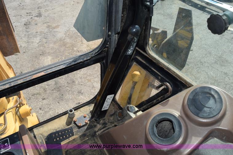 image for item L2565 1997 John Deere 310SE backhoe