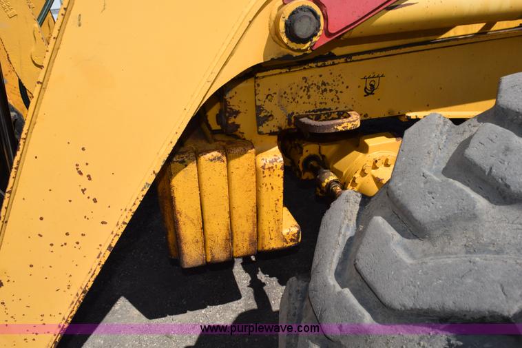 image for item L2565 1997 John Deere 310SE backhoe