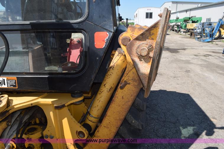 image for item L2565 1997 John Deere 310SE backhoe
