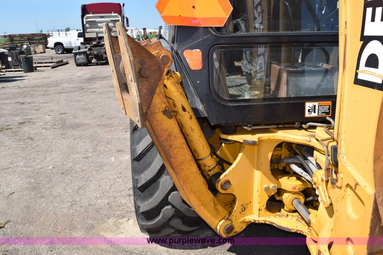 image for item L2565 1997 John Deere 310SE backhoe