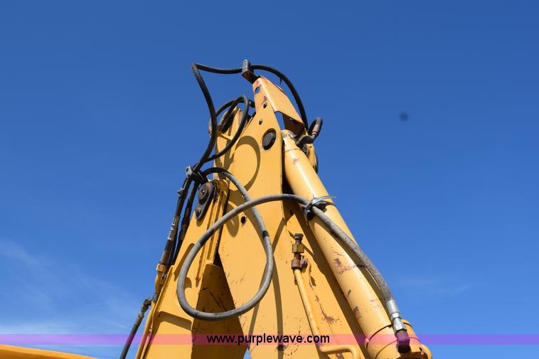 image for item L2565 1997 John Deere 310SE backhoe