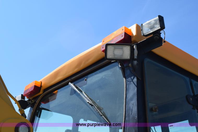 image for item L2565 1997 John Deere 310SE backhoe