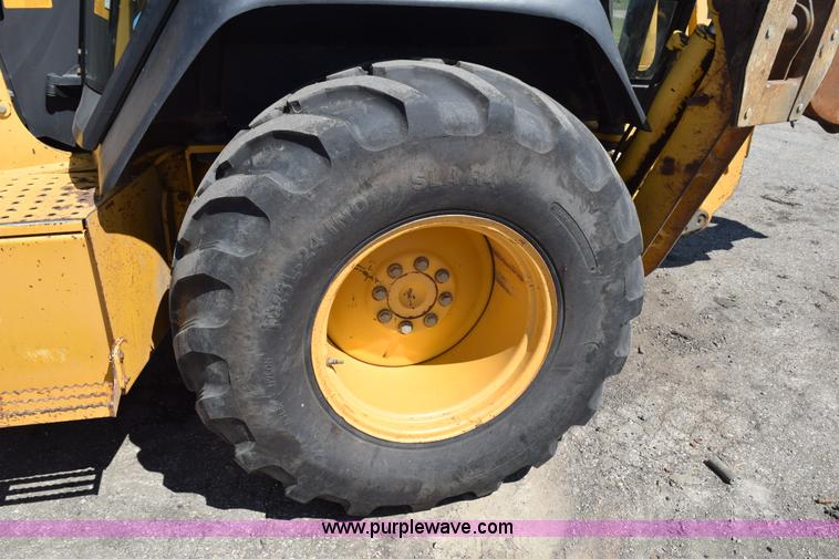 image for item L2565 1997 John Deere 310SE backhoe