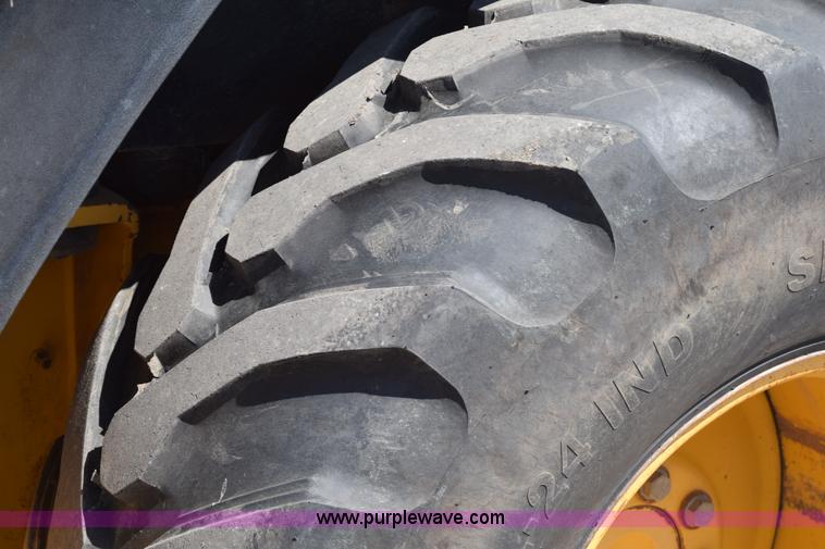 image for item L2565 1997 John Deere 310SE backhoe