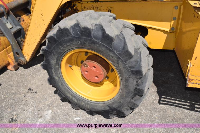 image for item L2565 1997 John Deere 310SE backhoe