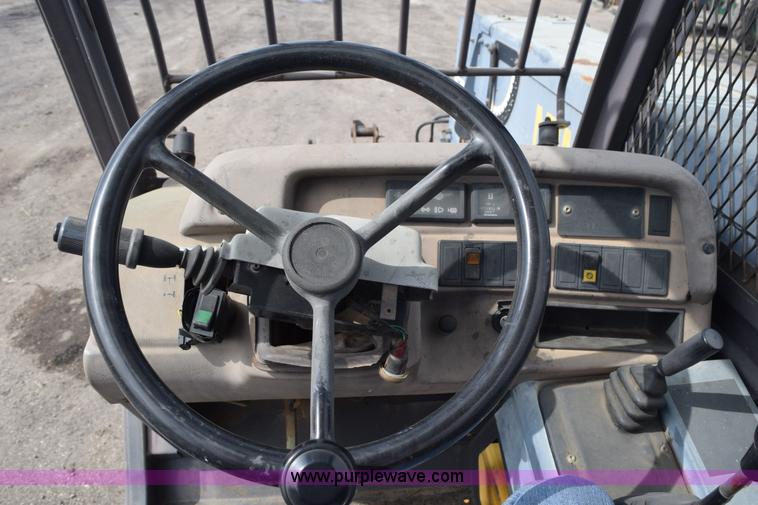 image for item L2568 1999 New Holland LM840 telehandler