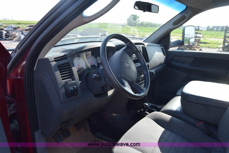 image for item L2578 2007 Dodge Ram 3500 Quad Cab flatbed pickup truck