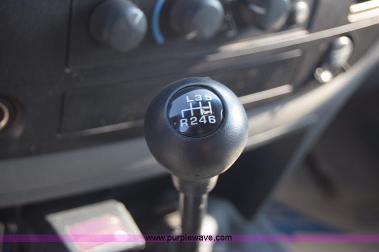 image for item L2578 2007 Dodge Ram 3500 Quad Cab flatbed pickup truck