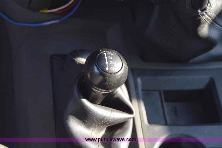 image for item L2578 2007 Dodge Ram 3500 Quad Cab flatbed pickup truck