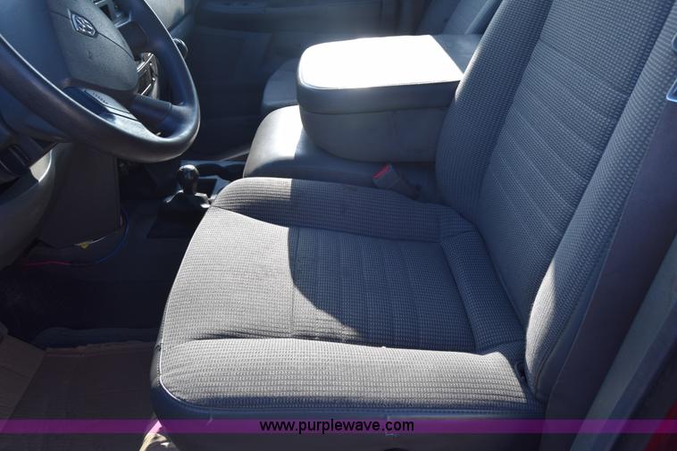 image for item L2578 2007 Dodge Ram 3500 Quad Cab flatbed pickup truck