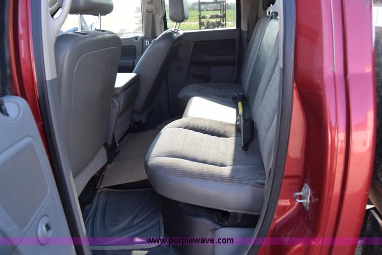 image for item L2578 2007 Dodge Ram 3500 Quad Cab flatbed pickup truck