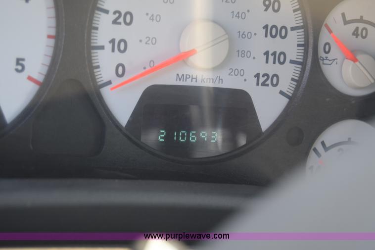 image for item L2578 2007 Dodge Ram 3500 Quad Cab flatbed pickup truck