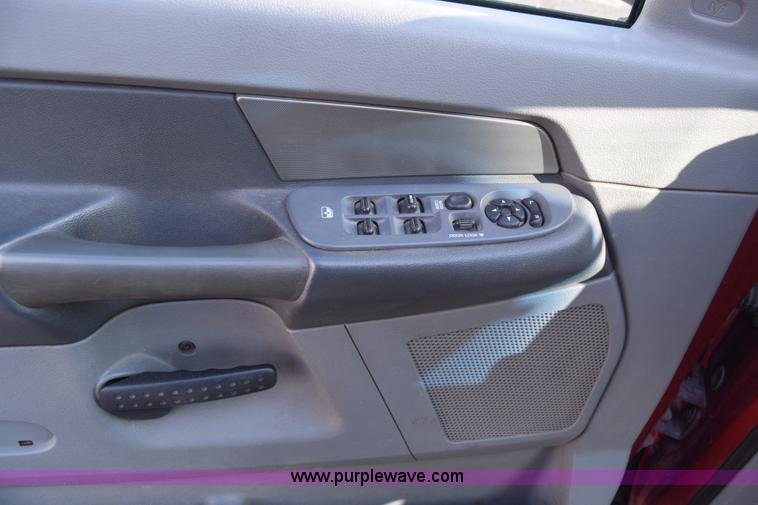 image for item L2578 2007 Dodge Ram 3500 Quad Cab flatbed pickup truck