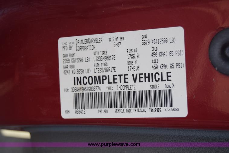 image for item L2578 2007 Dodge Ram 3500 Quad Cab flatbed pickup truck