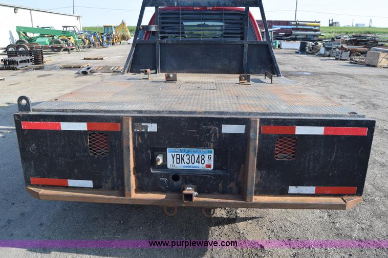 image for item L2578 2007 Dodge Ram 3500 Quad Cab flatbed pickup truck