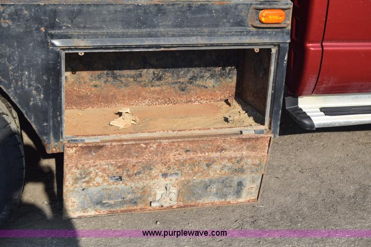 image for item L2578 2007 Dodge Ram 3500 Quad Cab flatbed pickup truck