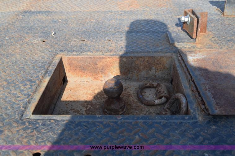 image for item L2578 2007 Dodge Ram 3500 Quad Cab flatbed pickup truck