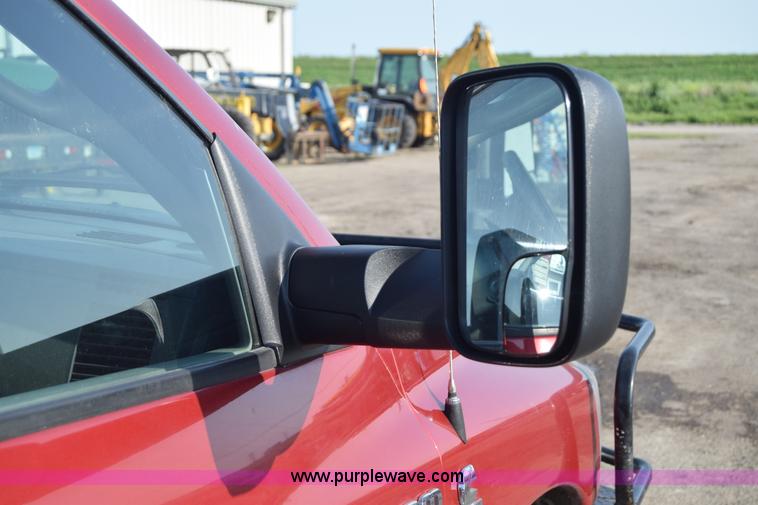 image for item L2578 2007 Dodge Ram 3500 Quad Cab flatbed pickup truck