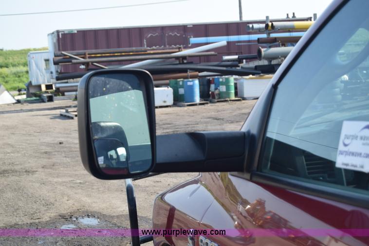 image for item L2578 2007 Dodge Ram 3500 Quad Cab flatbed pickup truck