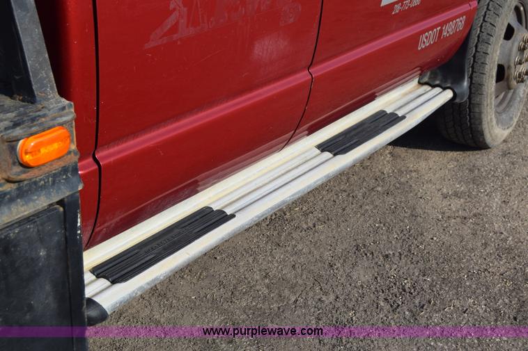 image for item L2578 2007 Dodge Ram 3500 Quad Cab flatbed pickup truck