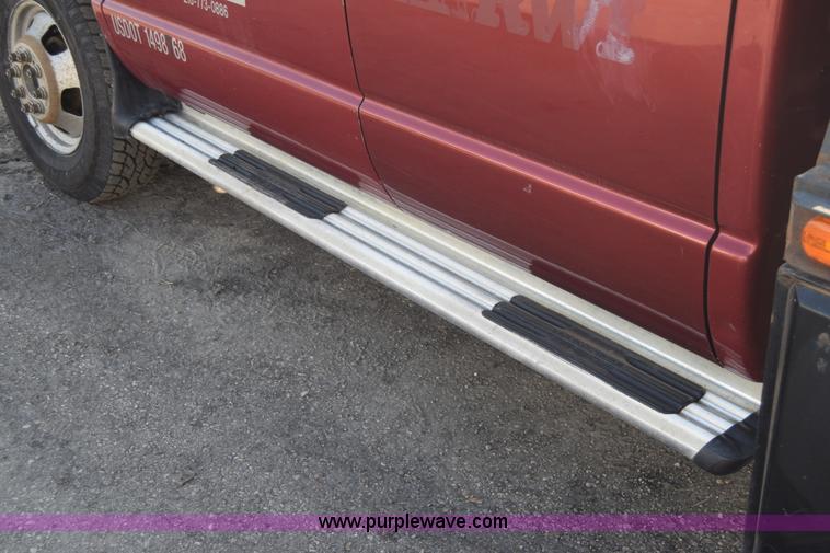 image for item L2578 2007 Dodge Ram 3500 Quad Cab flatbed pickup truck
