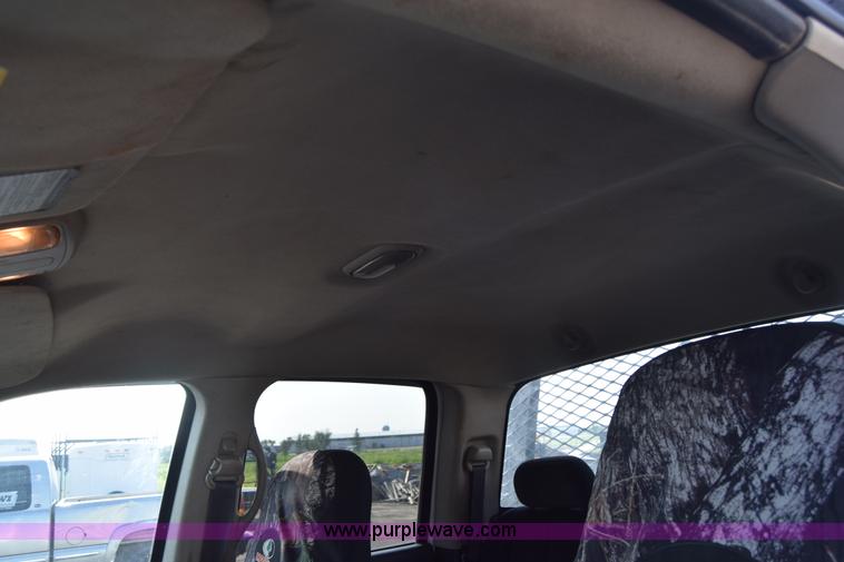 image for item L2579 2004 Dodge Ram 3500 Quad Cab flatbed pickup truck