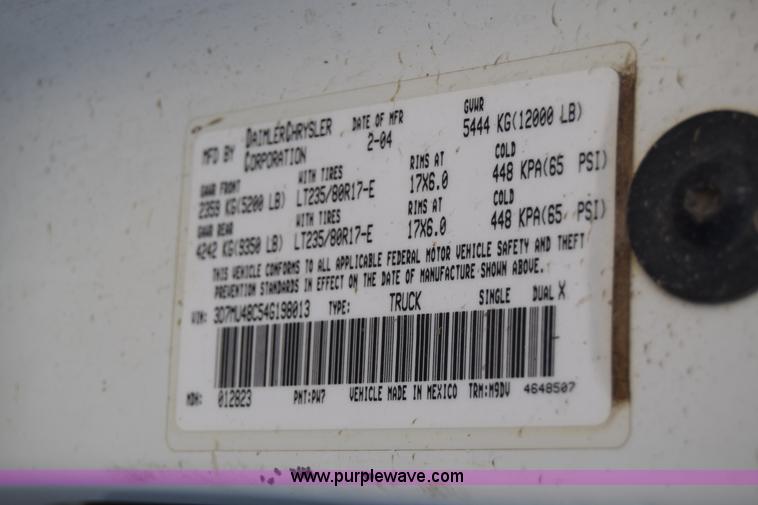 image for item L2579 2004 Dodge Ram 3500 Quad Cab flatbed pickup truck