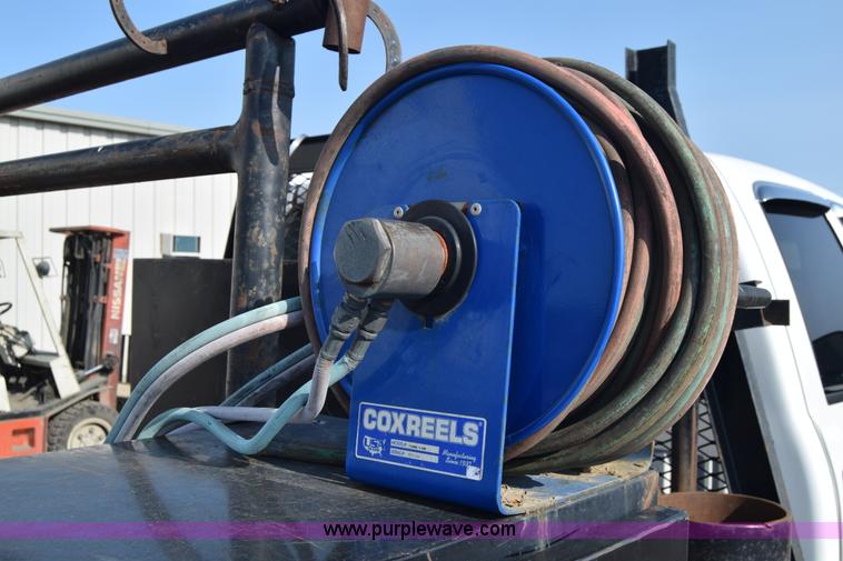 image for item L2579 2004 Dodge Ram 3500 Quad Cab flatbed pickup truck