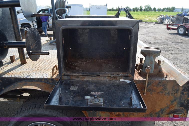 image for item L2579 2004 Dodge Ram 3500 Quad Cab flatbed pickup truck