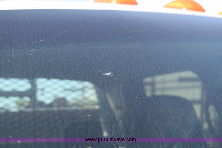 image for item L2579 2004 Dodge Ram 3500 Quad Cab flatbed pickup truck