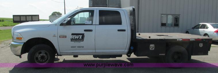 image for item L2631 2011 Dodge Ram 3500 Crew Cab flatbed pickup truck