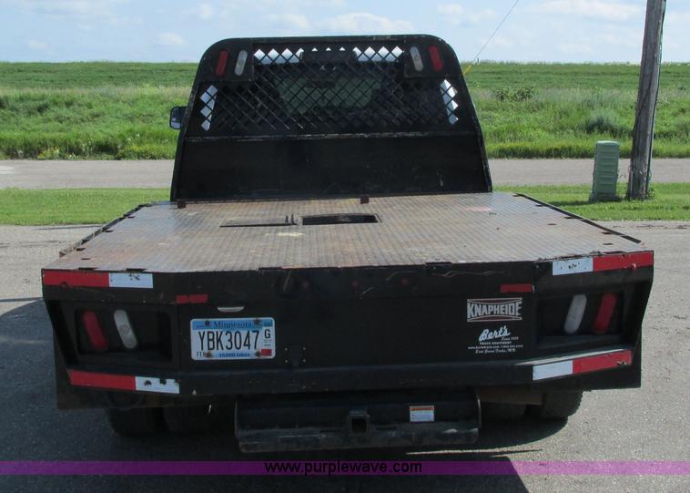 image for item L2631 2011 Dodge Ram 3500 Crew Cab flatbed pickup truck
