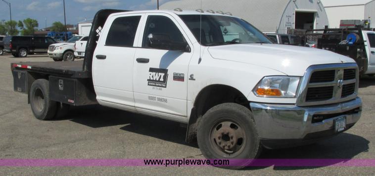 image for item L2631 2011 Dodge Ram 3500 Crew Cab flatbed pickup truck