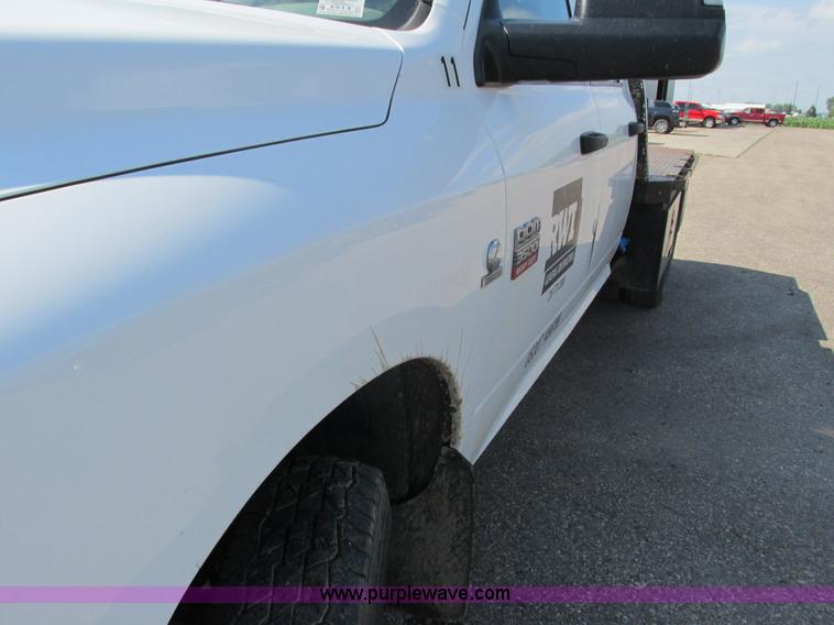 image for item L2631 2011 Dodge Ram 3500 Crew Cab flatbed pickup truck
