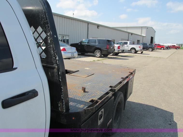 image for item L2631 2011 Dodge Ram 3500 Crew Cab flatbed pickup truck