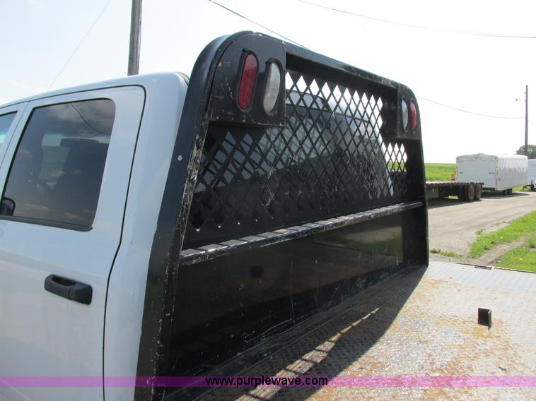 image for item L2631 2011 Dodge Ram 3500 Crew Cab flatbed pickup truck