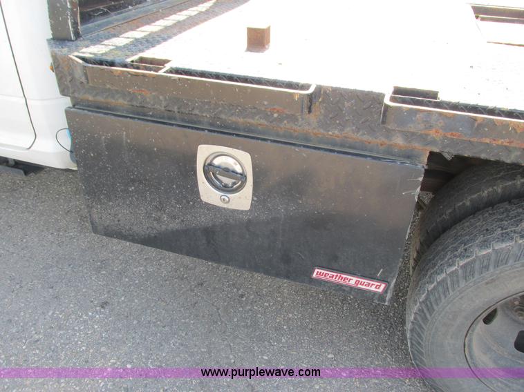 image for item L2631 2011 Dodge Ram 3500 Crew Cab flatbed pickup truck