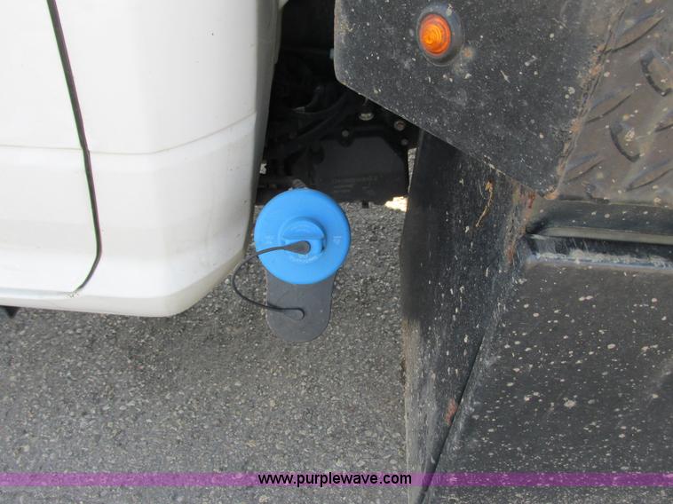 image for item L2631 2011 Dodge Ram 3500 Crew Cab flatbed pickup truck