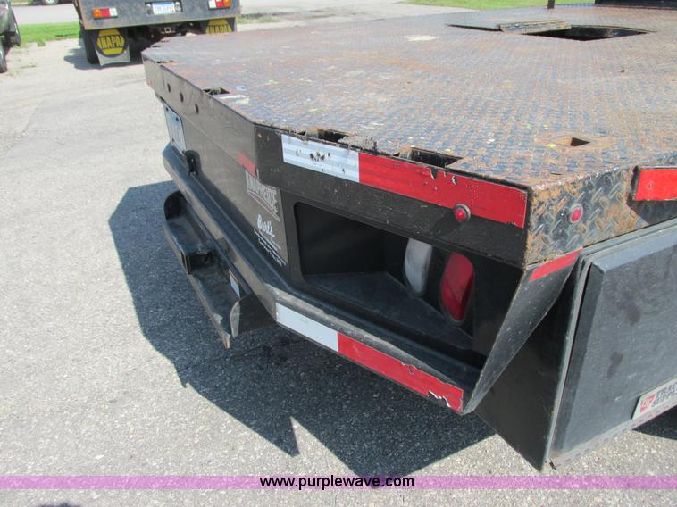 image for item L2631 2011 Dodge Ram 3500 Crew Cab flatbed pickup truck