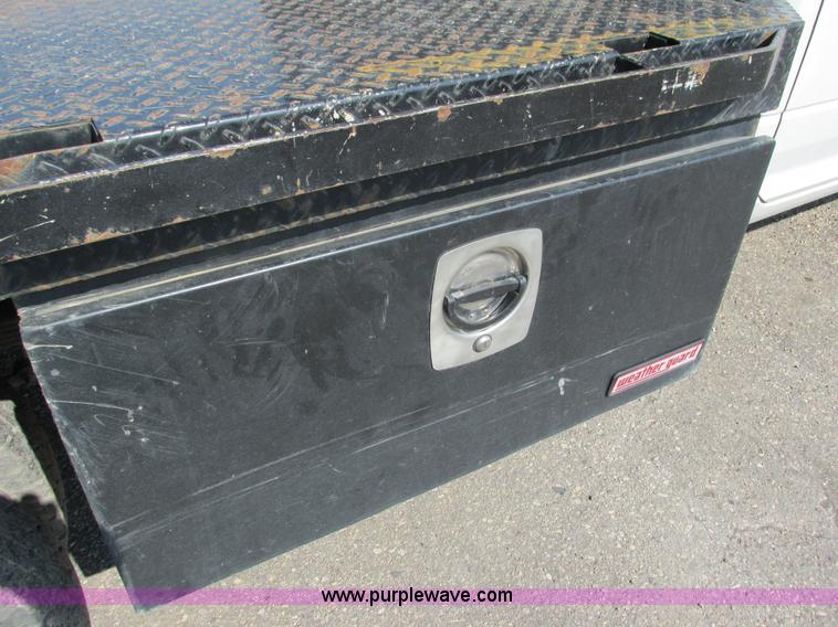 image for item L2631 2011 Dodge Ram 3500 Crew Cab flatbed pickup truck