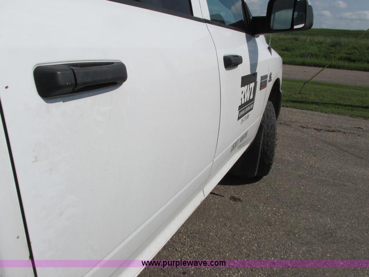 image for item L2631 2011 Dodge Ram 3500 Crew Cab flatbed pickup truck