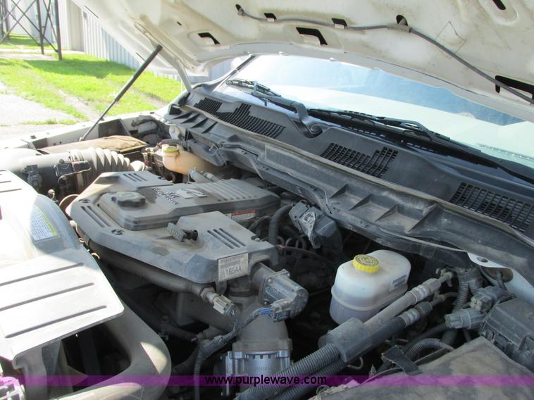 image for item L2631 2011 Dodge Ram 3500 Crew Cab flatbed pickup truck