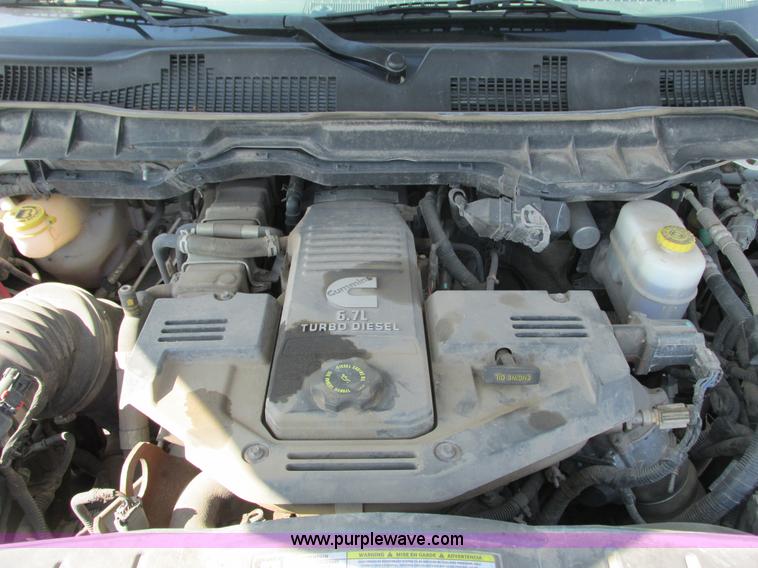 image for item L2631 2011 Dodge Ram 3500 Crew Cab flatbed pickup truck