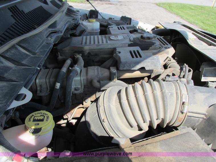 image for item L2631 2011 Dodge Ram 3500 Crew Cab flatbed pickup truck